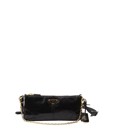 Prada Re-edition 2002 Medium Leather Shoulder Bag In Black