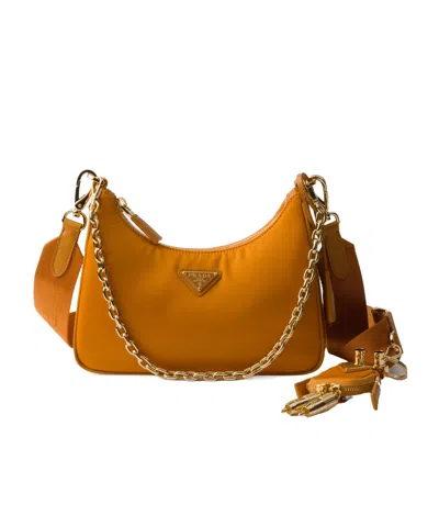 Prada Re-edition 2005 Re-nylon And Saffiano Leather Bag With Charm In Amber