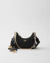 Prada Re-edition 2005 Re-nylon And Saffiano Leather Bag With Charm In Black