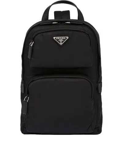 Prada Re-nylon And Saffiano Leather Backpack In F0002 Nero