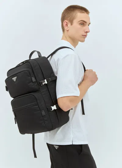 Prada Re-nylon And Saffiano Leather Backpack In Black