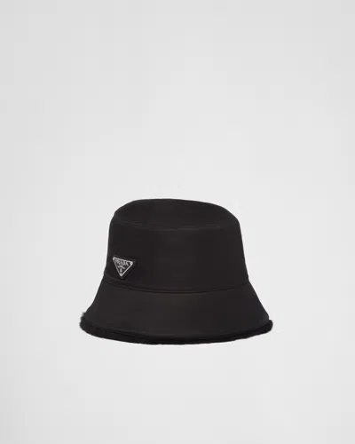 PRADA RE-NYLON AND SHEARLING BUCKET HAT