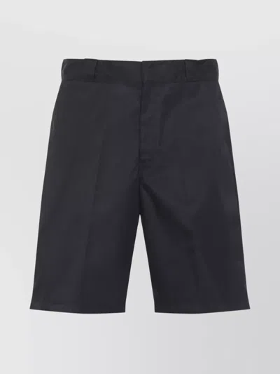 PRADA RE-NYLON BERMUDA SHORTS AND POCKETS