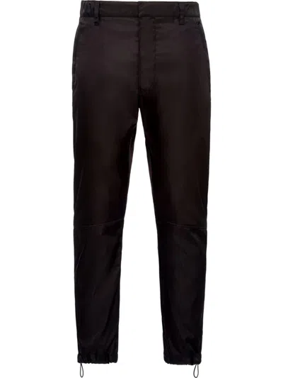 PRADA PRADA RE-NYLON CROPPED TROUSERS