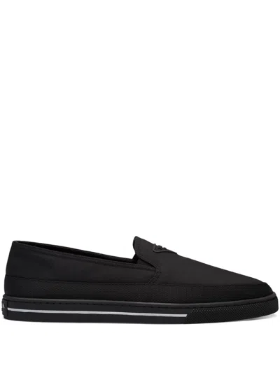 PRADA RE-NYLON EMBOSSED LOGO SLIP-ON TRAINERS