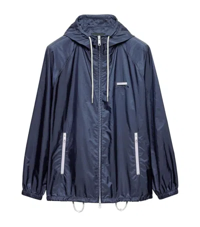 Prada Re-nylon Hooded Oversized Jacket In Blue