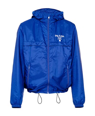 Prada Re-nylon Logo-print Blouson Jacket In Blue