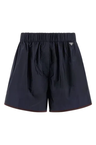 Prada Re-nylon Shorts In Blue