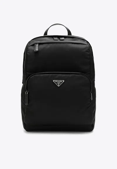 Prada Triangle Logo Leather Backpack In Black