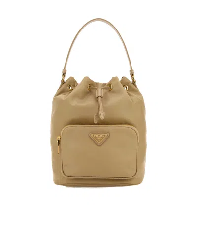 Prada Re-nylon Triangle-logo Drawstring Bucket Bag In Nude