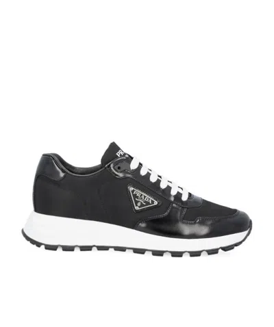 PRADA LOGO-PATCH LOW-TOP SNEAKERS