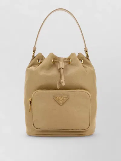 Prada Re-nylon Triangle-logo Drawstring Bucket Bag In Nude