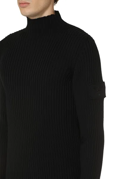 Prada Ribbed Virgin Wool Turtleneck Sweater In Black