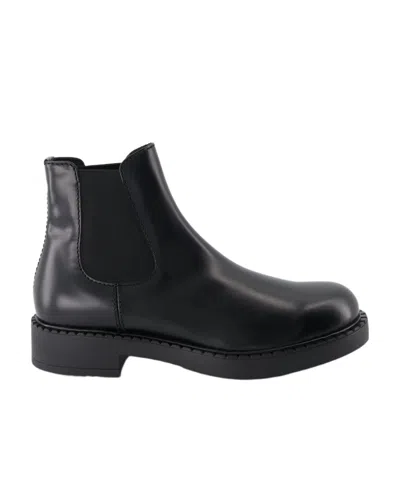 Prada Round Head Boots In Black