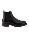Prada Mens Black Logo-debossed Heeled Leather Chelsea Boots In Ochre