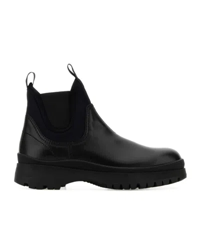 PRADA LEATHER AND STRETCH FABRIC BRIXXEN BOOTS