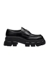 Prada Monolith Patent Leather Flatform Loafers In Black