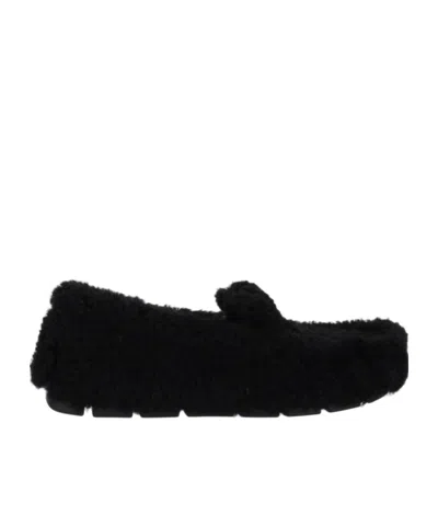 Prada Triangle Logo Shearling Loafers In Black
