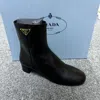Prada Round-head Short Boots In Black
