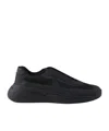 Prada Round-head Sneakers In Black