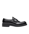 Prada Triangle Logo Brushed Leather Loafers In Black