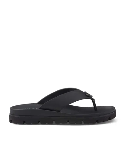 Prada Triangle Logo Rubber Thong Sandals In Black