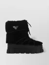 PRADA SHEARLING AND RUBBER ANKLE BOOTS WITH FUR TEXTURE