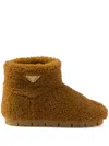 Prada Sheepskin Ankle Boots In Brown