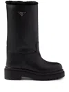 Prada Leather And Shearling Boots In Black