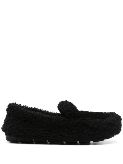 Prada Triangle Logo Shearling Loafers In Black