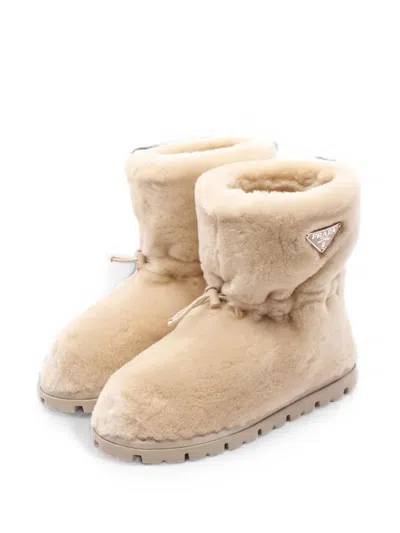 Pre-owned Prada Shearling Logo Plate Boots In Neutral