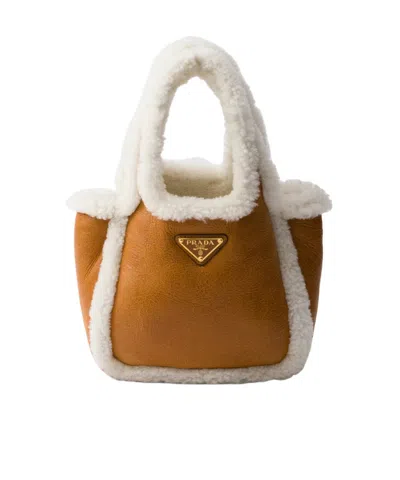Prada Shearling Mini Handbag In Cognac/natural