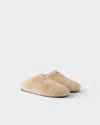 Prada Triangle-logo Shearling Mules In Nude