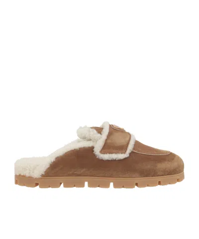 Prada Round Toe Suede Mules With Shearling Lining In Brown