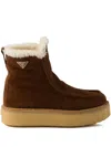 Prada Platform Booties Featuring Shearling Lining In Brown