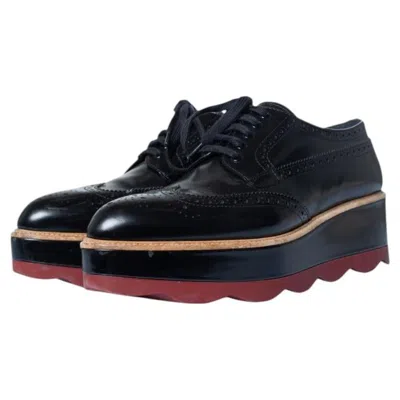 Pre-owned Prada , Shiny Leather Broque Platform Sneakers In Black