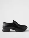Prada Re-edition 1999 Equal Platform Penny Loafer In Animal Print