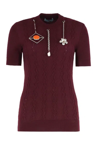 PRADA PRADA SHORT-SLEEVED WOOL SHIRT WITH CHARMS