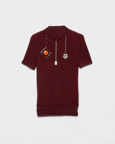 PRADA SHORT-SLEEVED WOOL SWEATER WITH PENDANTS