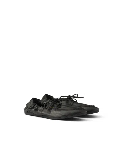 Prada Antikleder-bootsschuhe In Black