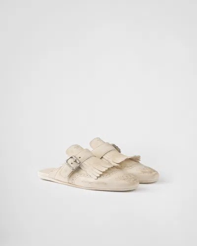 PRADA SHUFFLE FRINGED LEATHER MULES