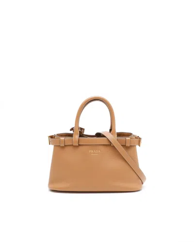 Prada Small Buckle Bag In Brown