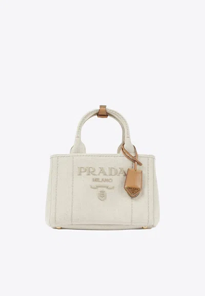 Prada Small Logo Embroidered Canvas Tote Bag In Beige