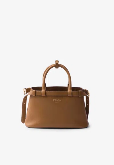 Prada Small Logo Leather Top Handle Bag In Brown