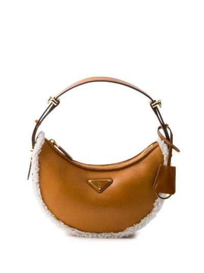 Prada Small Shearling Shoulder Bag In Brown