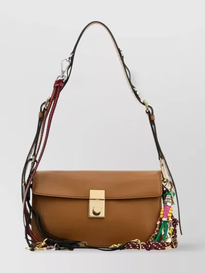 Prada Small Soft Sound Shoulder Bag With Tassels In Brown