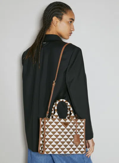 Prada Small Symbole Embroidered Handbag In Black