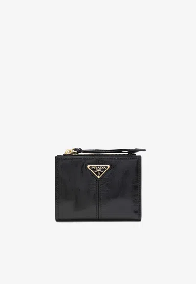 Prada Small Triangle Logo Leather Wallet In Black