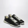 Prada Handcrafted Leather Sneakers Geometric Stitching In Black