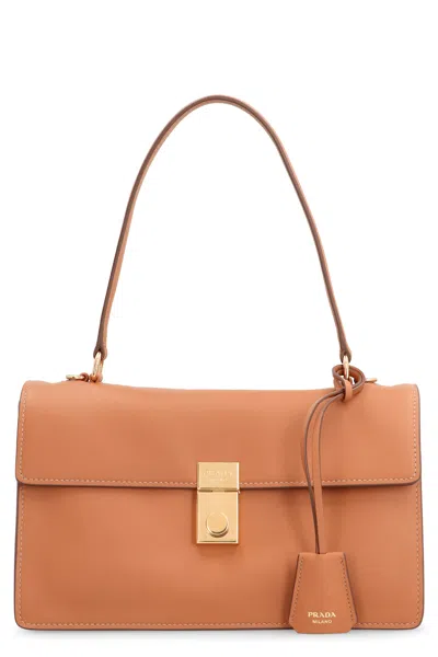 Prada Soft Sound Leather Shoulder Bag In Saddle Brown